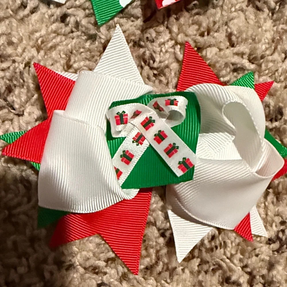 Girls 5 Christmas bows top bow is a custom Micky and Minnie Christmas bow